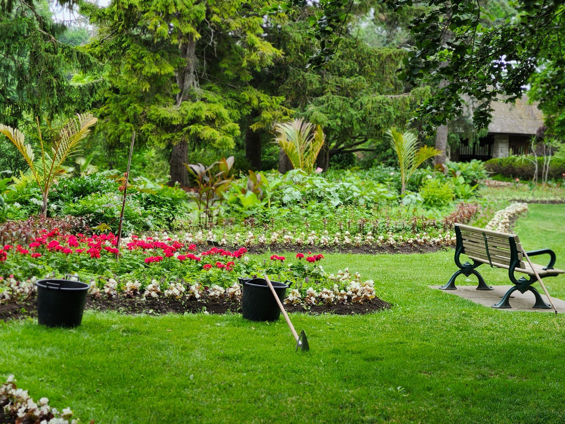 A stone path curving between planted beds